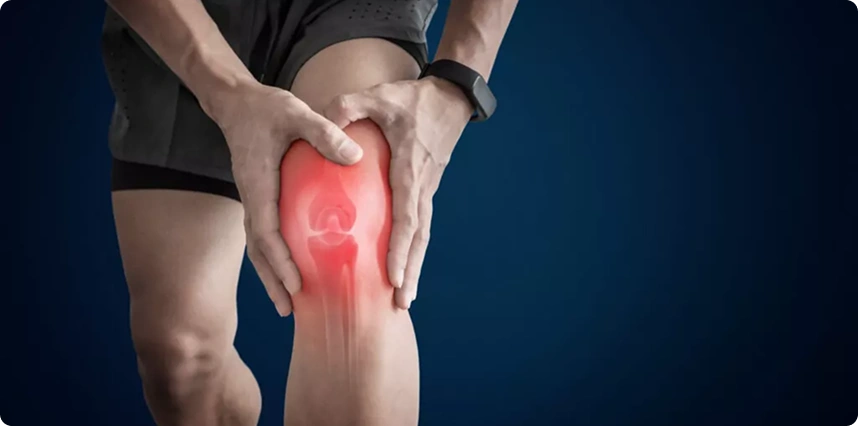 Man holding knee with highlighted pain indicating knee joint injury or inflammation.
